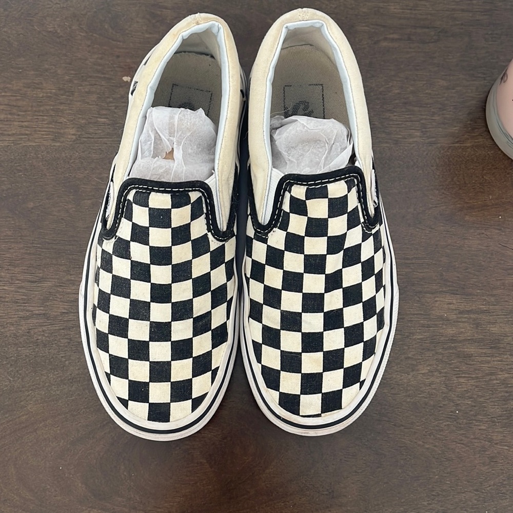 Black and White checkered vans.
